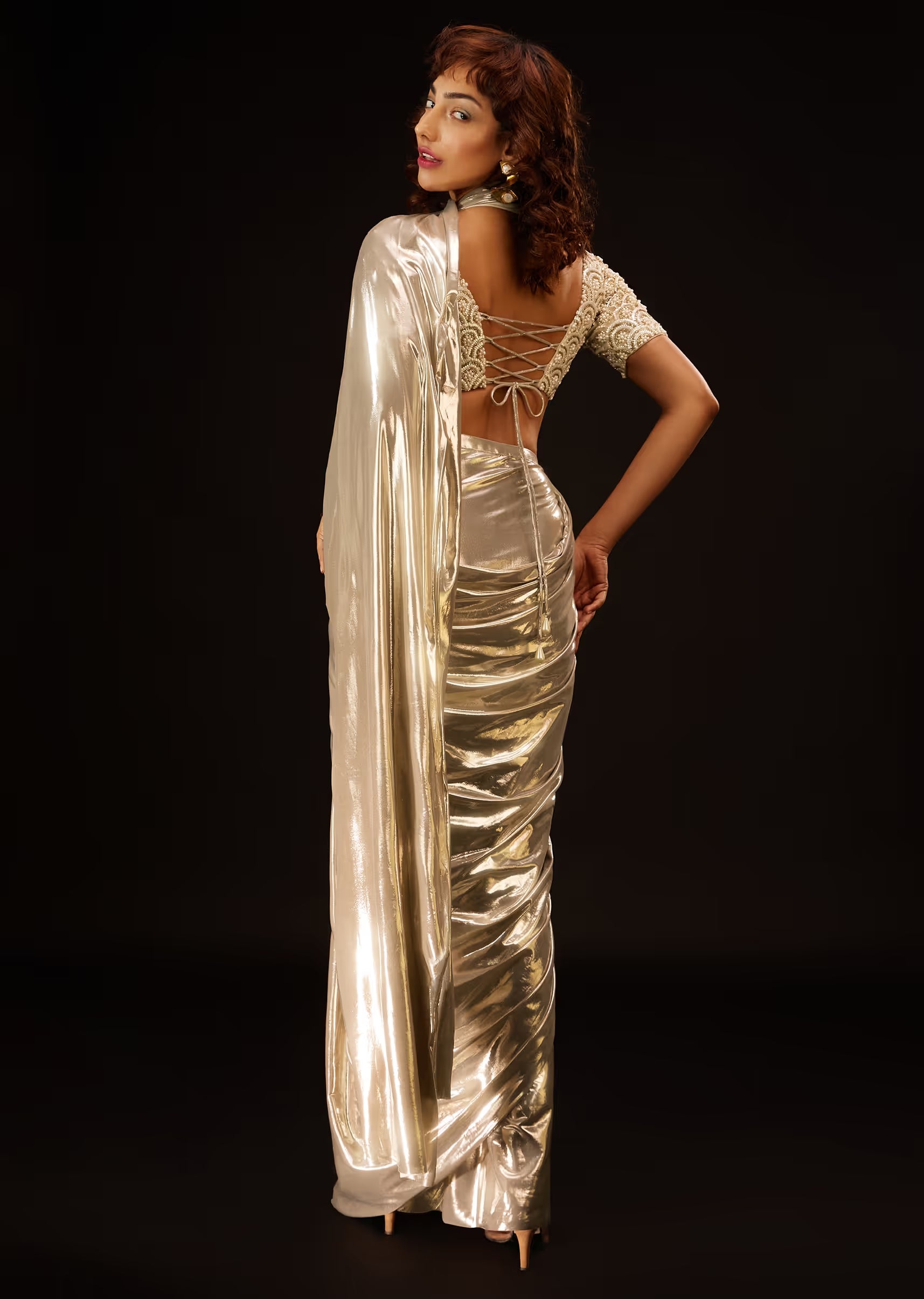 Metallic Gold Pre-Pleated Saree In Lycra With An Embroidered Blouse